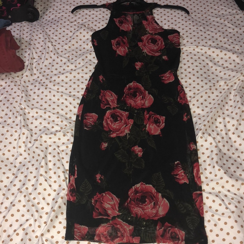Beautiful form fitting black floral dress